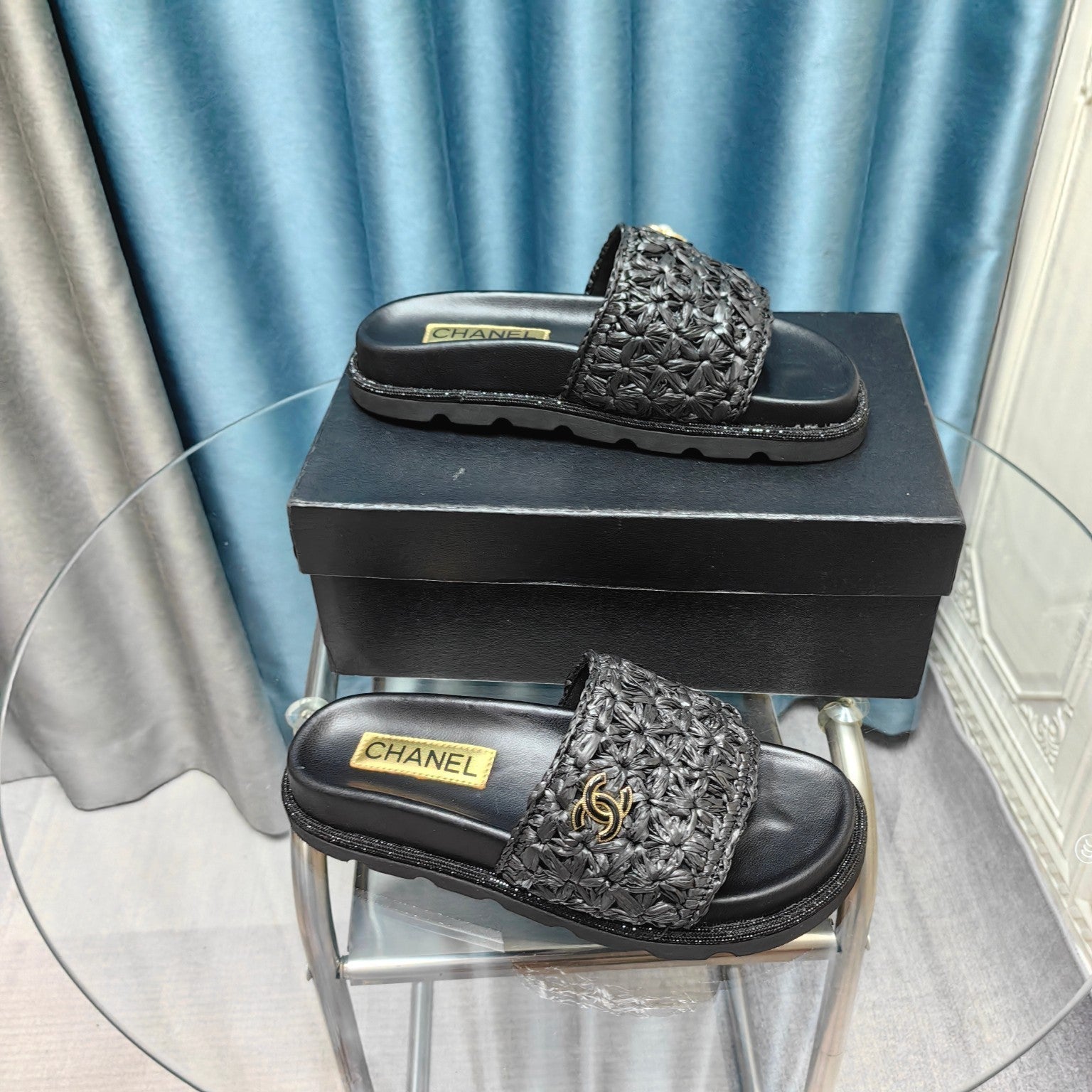 CHANEL KNIT SLIPPERS IN BLACK WOVEN SATIN AND SHEEPSKIN