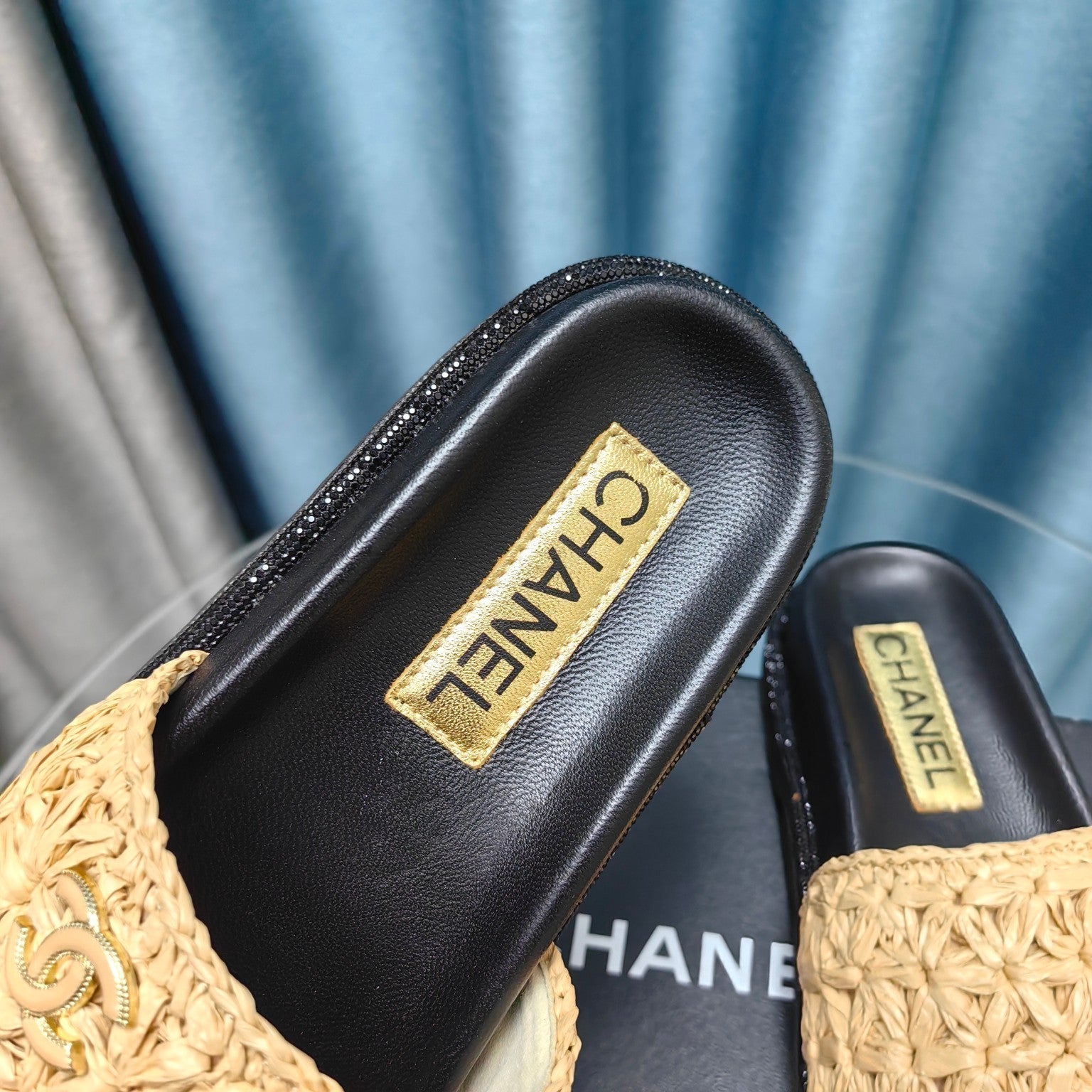 CHANEL KNIT SLIPPERS IN DARK CREAM WOVEN SATIN AND BLACK SHEEPSKIN
