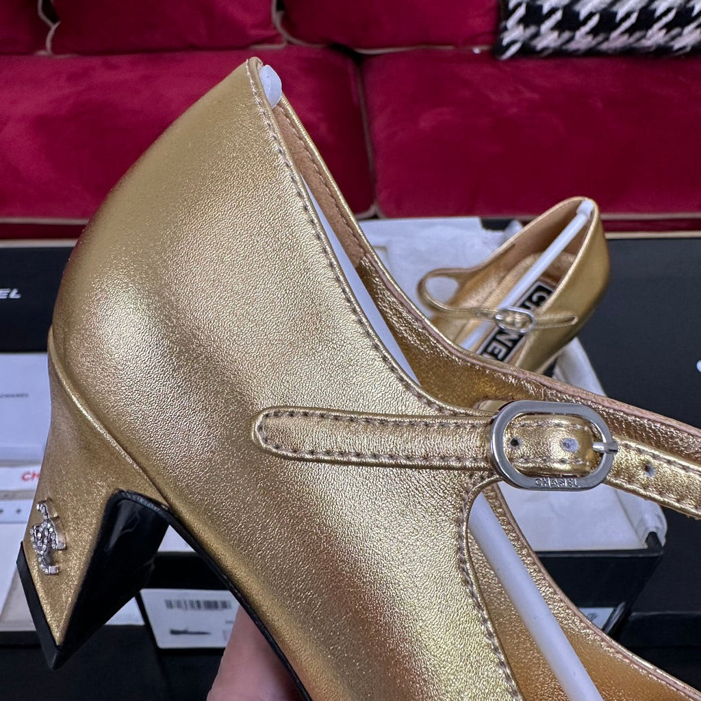 CHANEL HIGH MARY JANE IN GOLDEN CALFSKIN AND BLACK SATIN