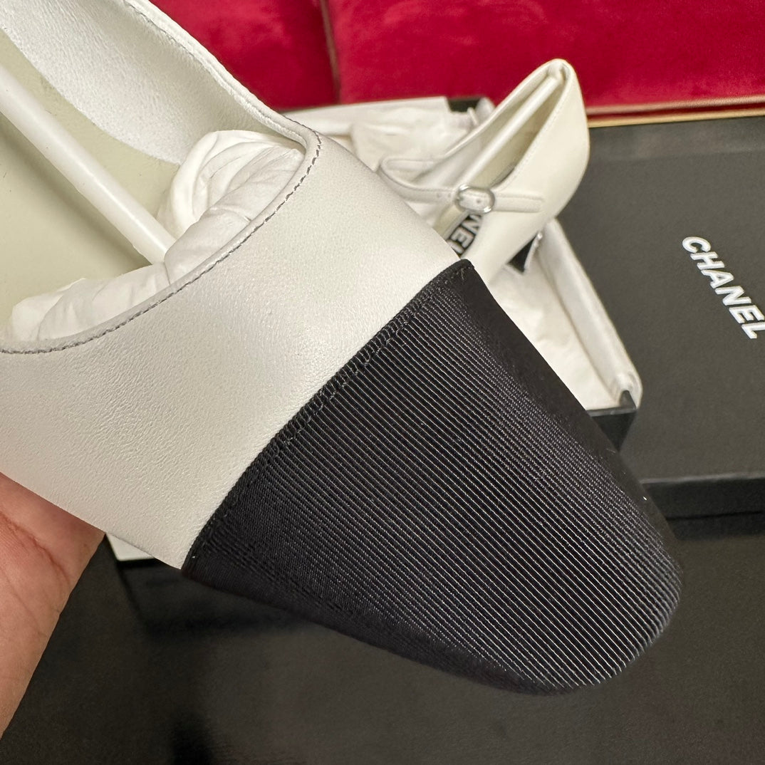 CHANEL HIGH MARY JANE IN WHITE CALFSKIN AND BLACK SATIN