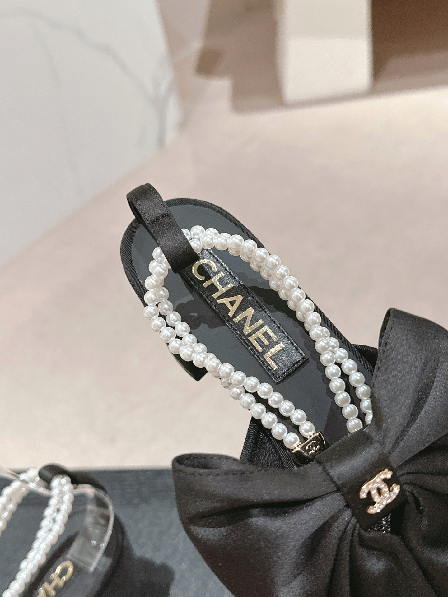 CHANEL HIGH SANDAL WITH PEARL CHAIN BLACK LAMBSKIN WITH RHINESTONES