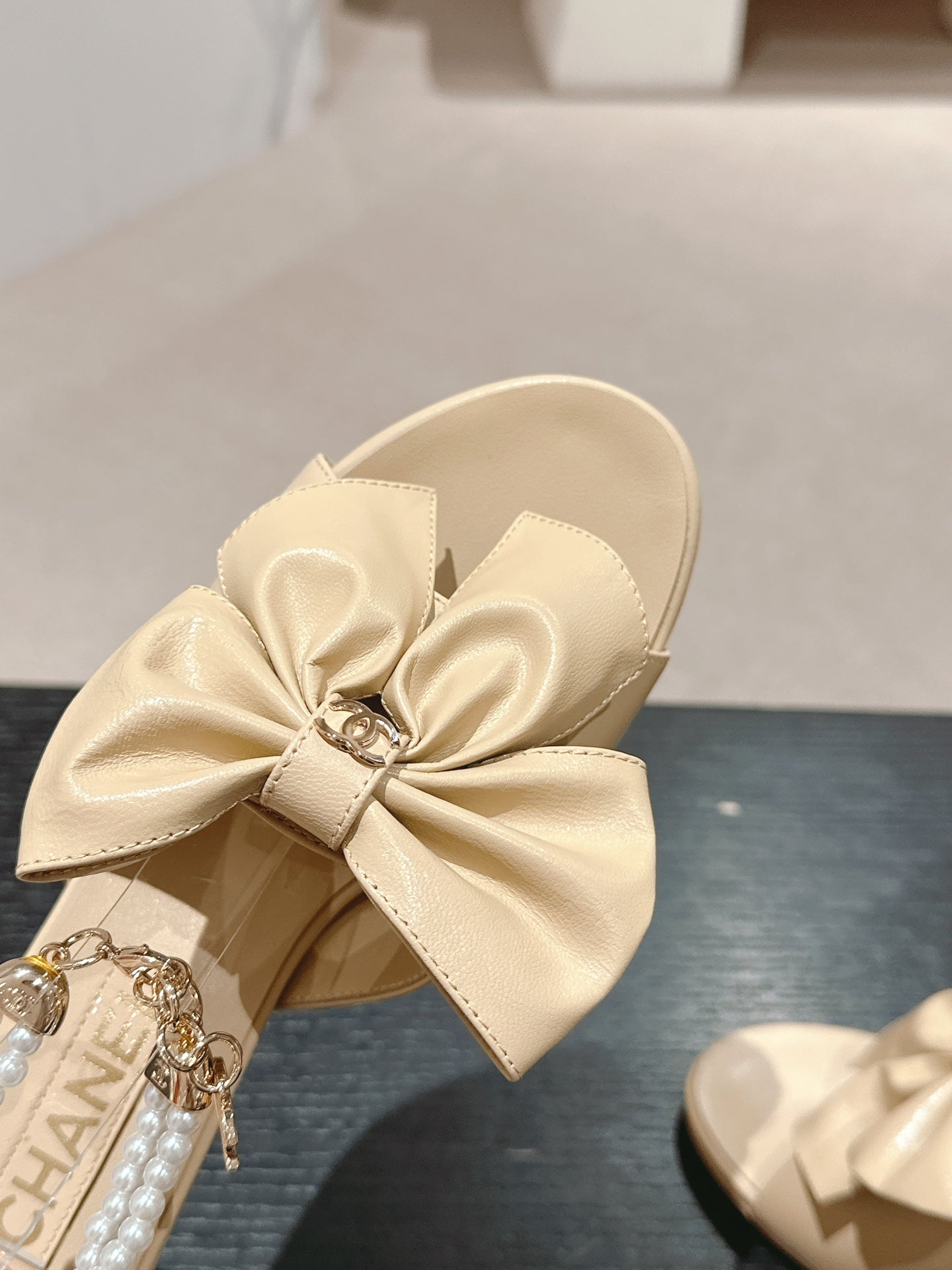 CHANEL HIGH SANDAL WITH PEARL CHAIN IN BEIGE CREAM LAMBSKIN