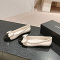 CHANEL BOWKNOT BALLET FLAT IN WHITE MIX BLACK SHEEPSKIN