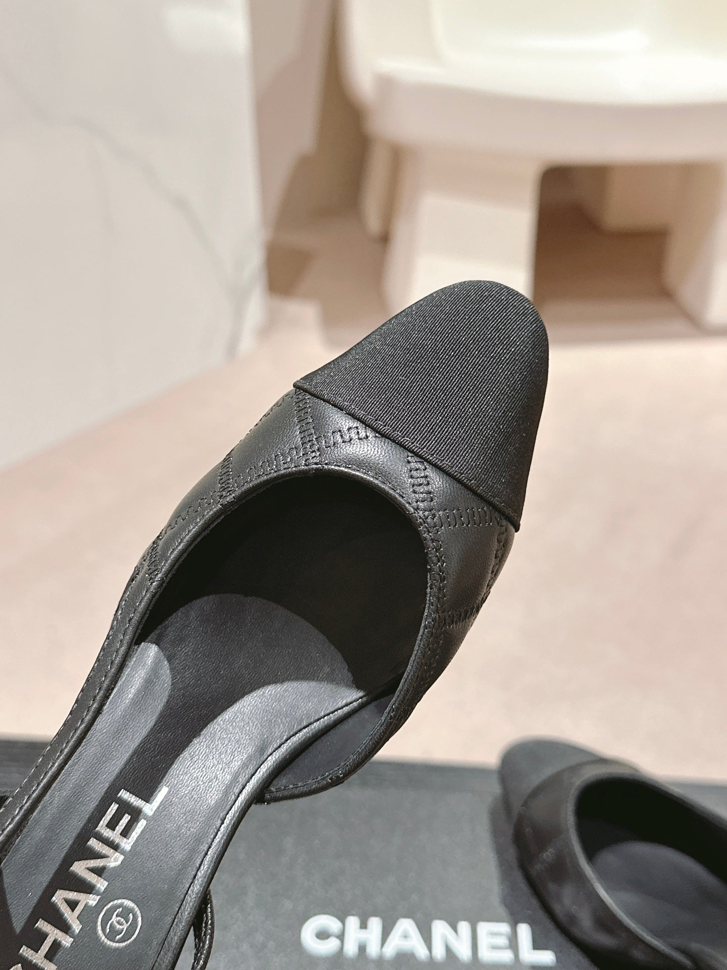 CHANEL HIGH SLINGBACKS IN BLACK LAMBSKIN AND SATIN