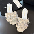 CHANEL FLAT MULE 15 MM IN PALE GRAY CALFSKIN