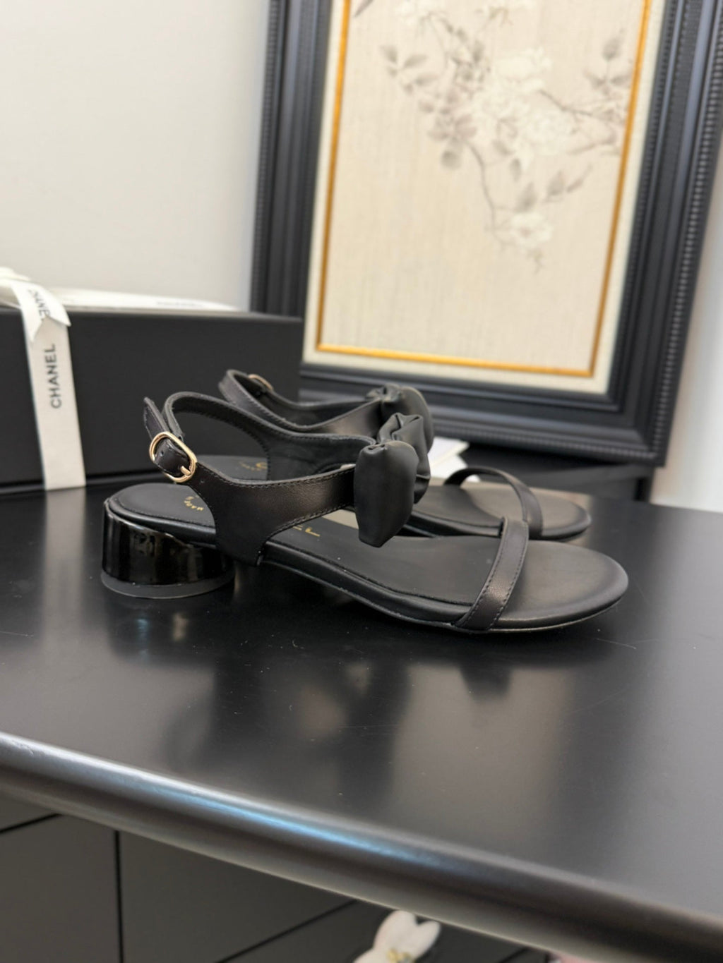 CHANEL FLAT SANDALS IN BLACK CALFSKIN WITH BOW