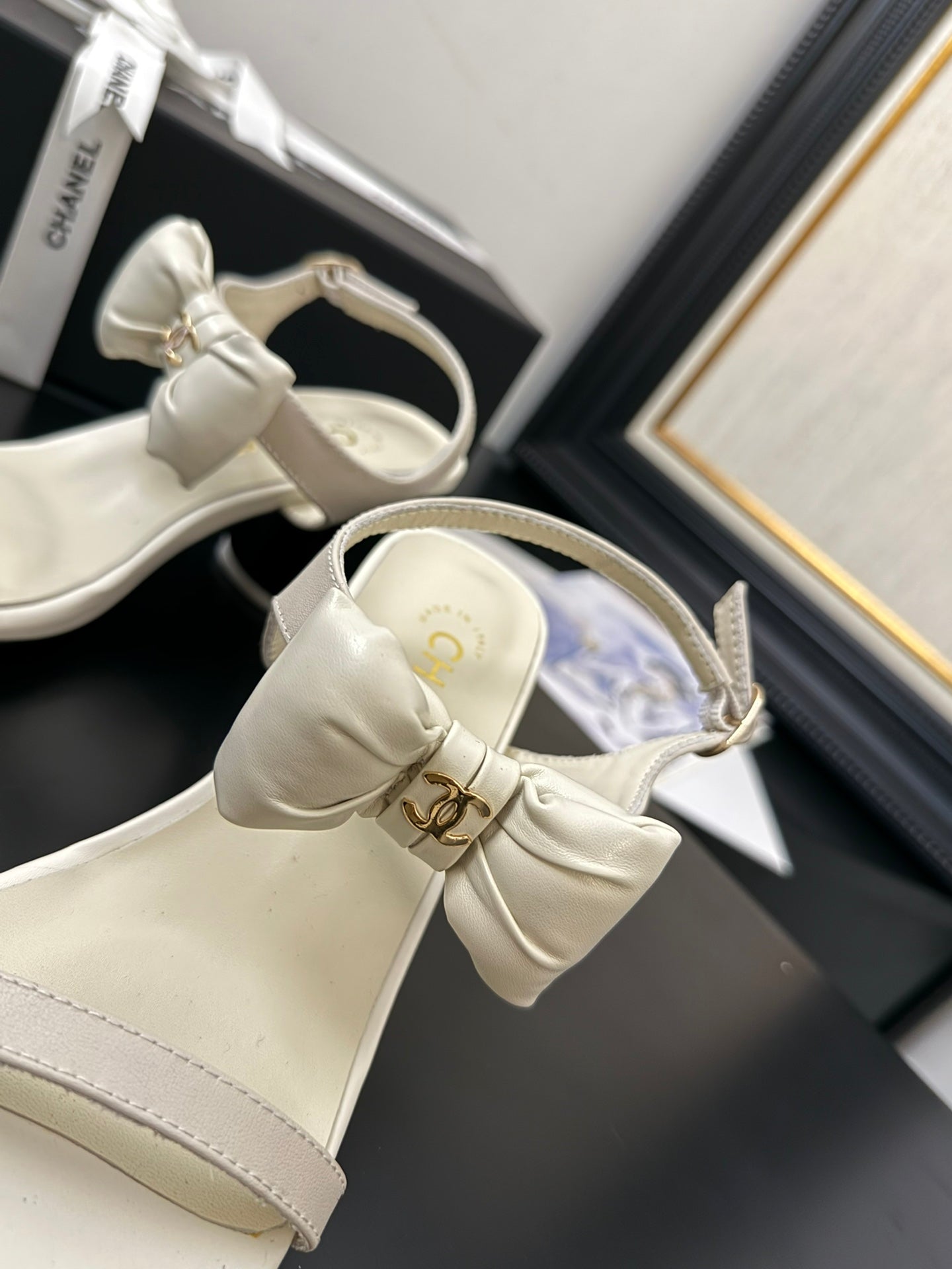 CHANEL MID HEEL SANDALS IN WHITE CALFSKIN WITH BOW