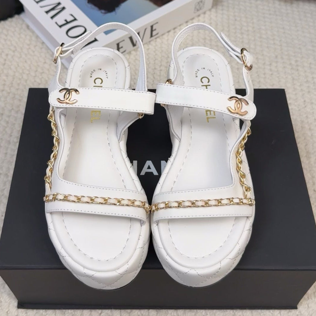 CHANEL THICK-SOLED SANDALS 55 MM IN WHITE CALFSKIN