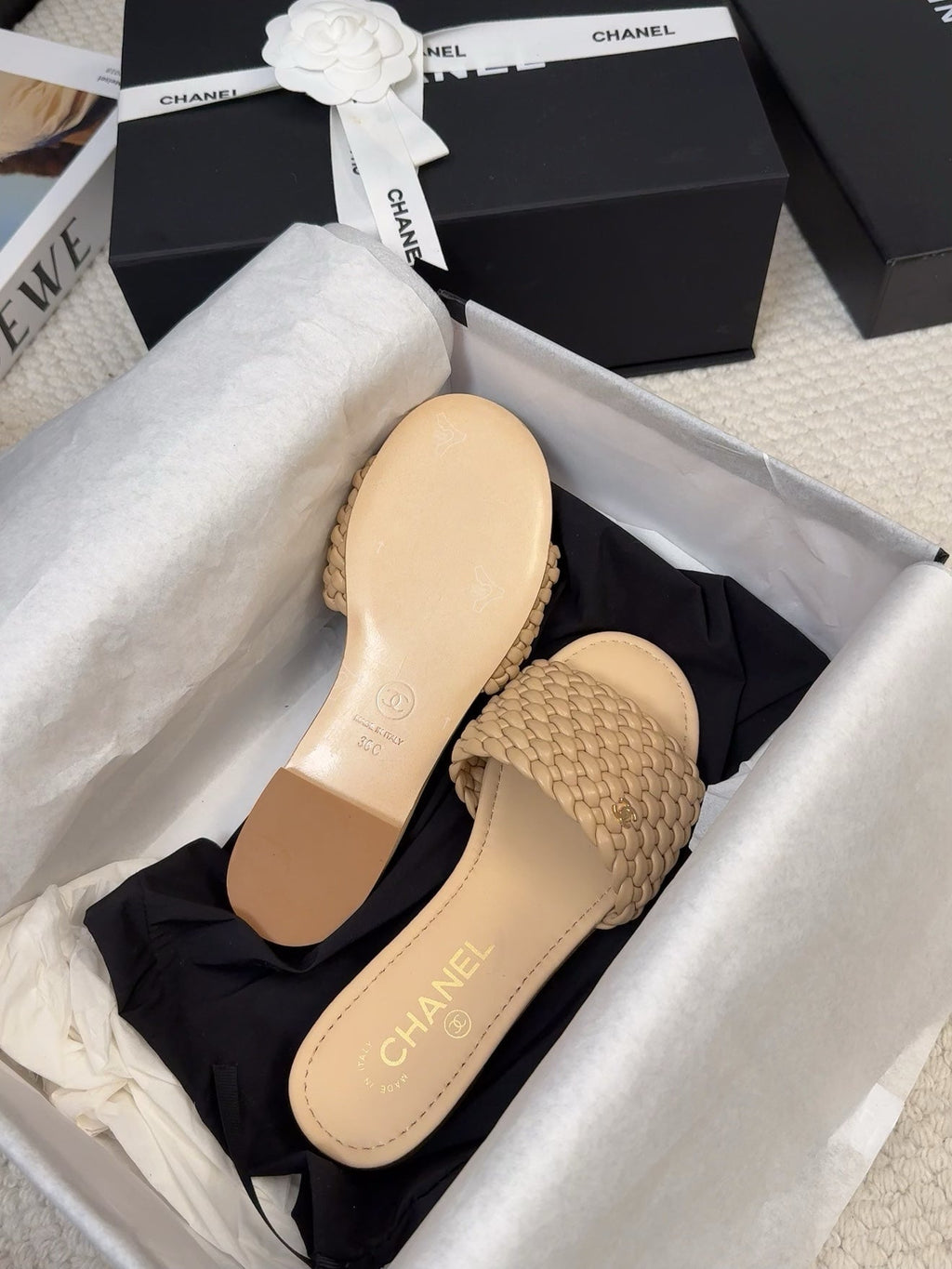 CHANEL FLAT SLIDES IN FLAX YELLOW LAMBSKIN