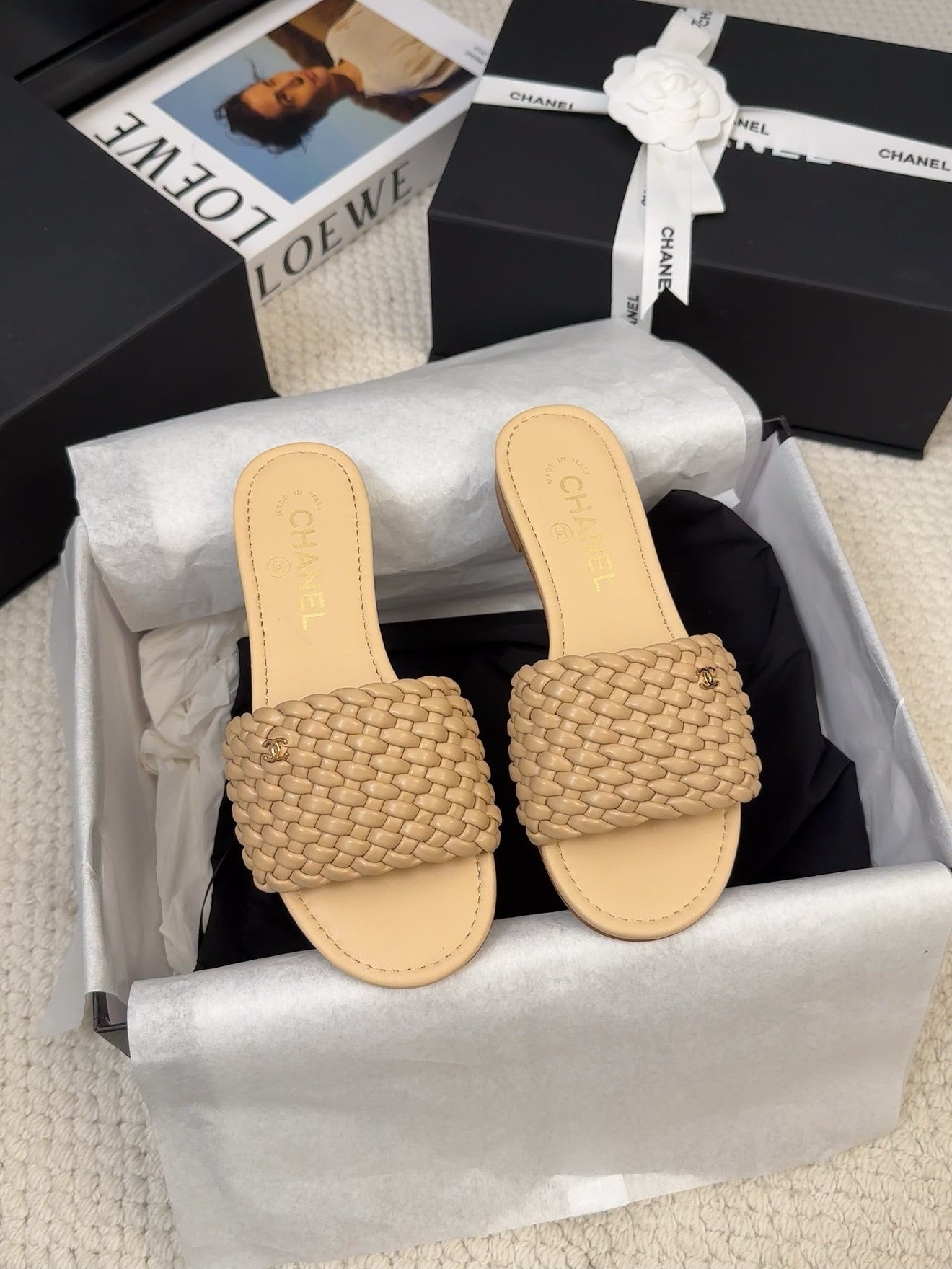 CHANEL FLAT SLIDES IN FLAX YELLOW LAMBSKIN