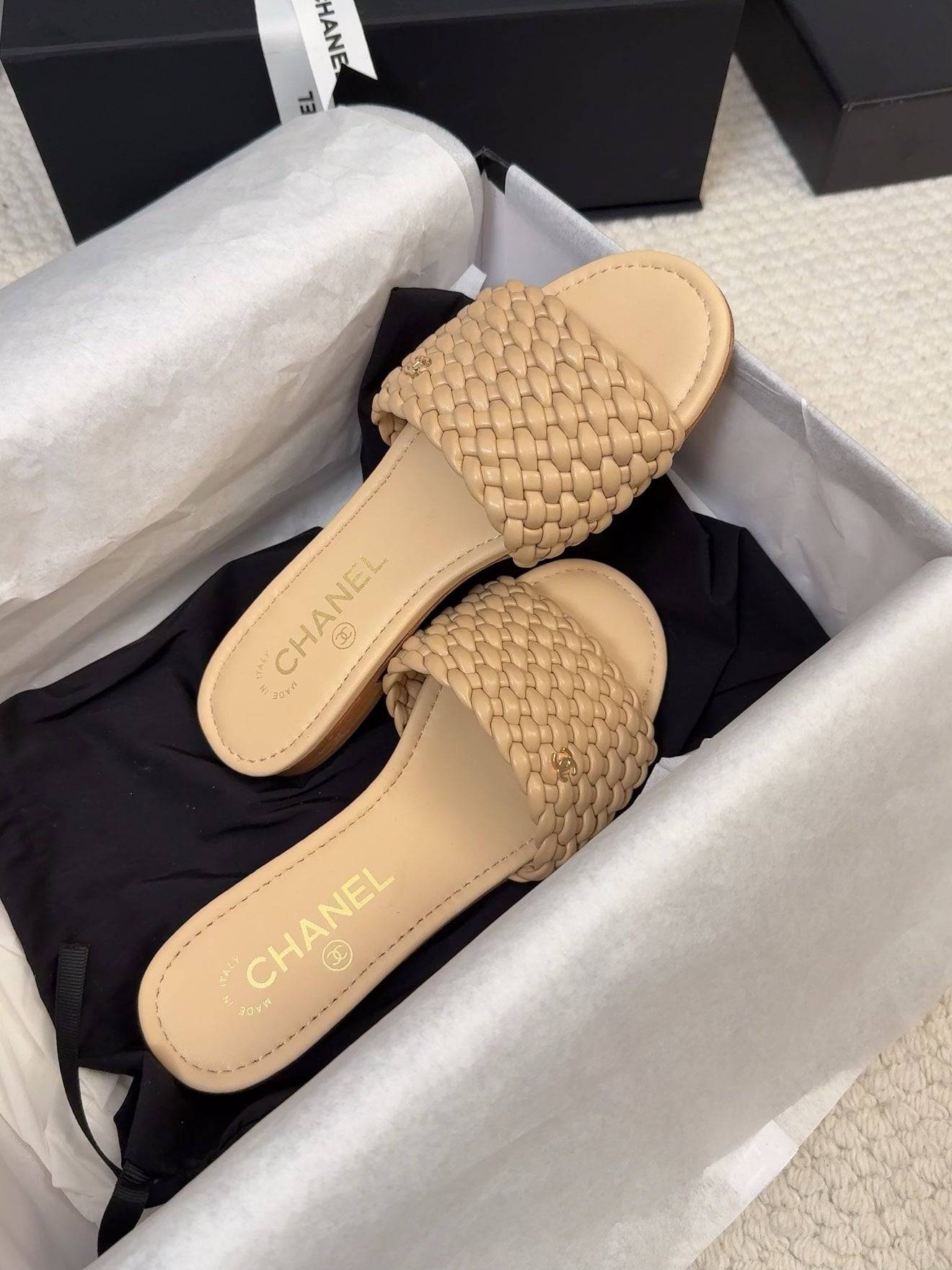 CHANEL FLAT SLIDES IN FLAX YELLOW LAMBSKIN
