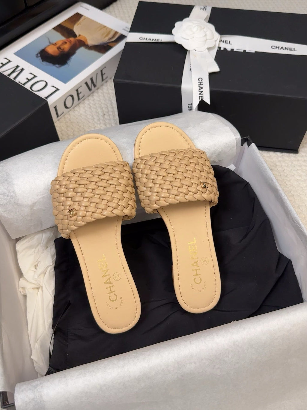 CHANEL FLAT SLIDES IN FLAX YELLOW LAMBSKIN