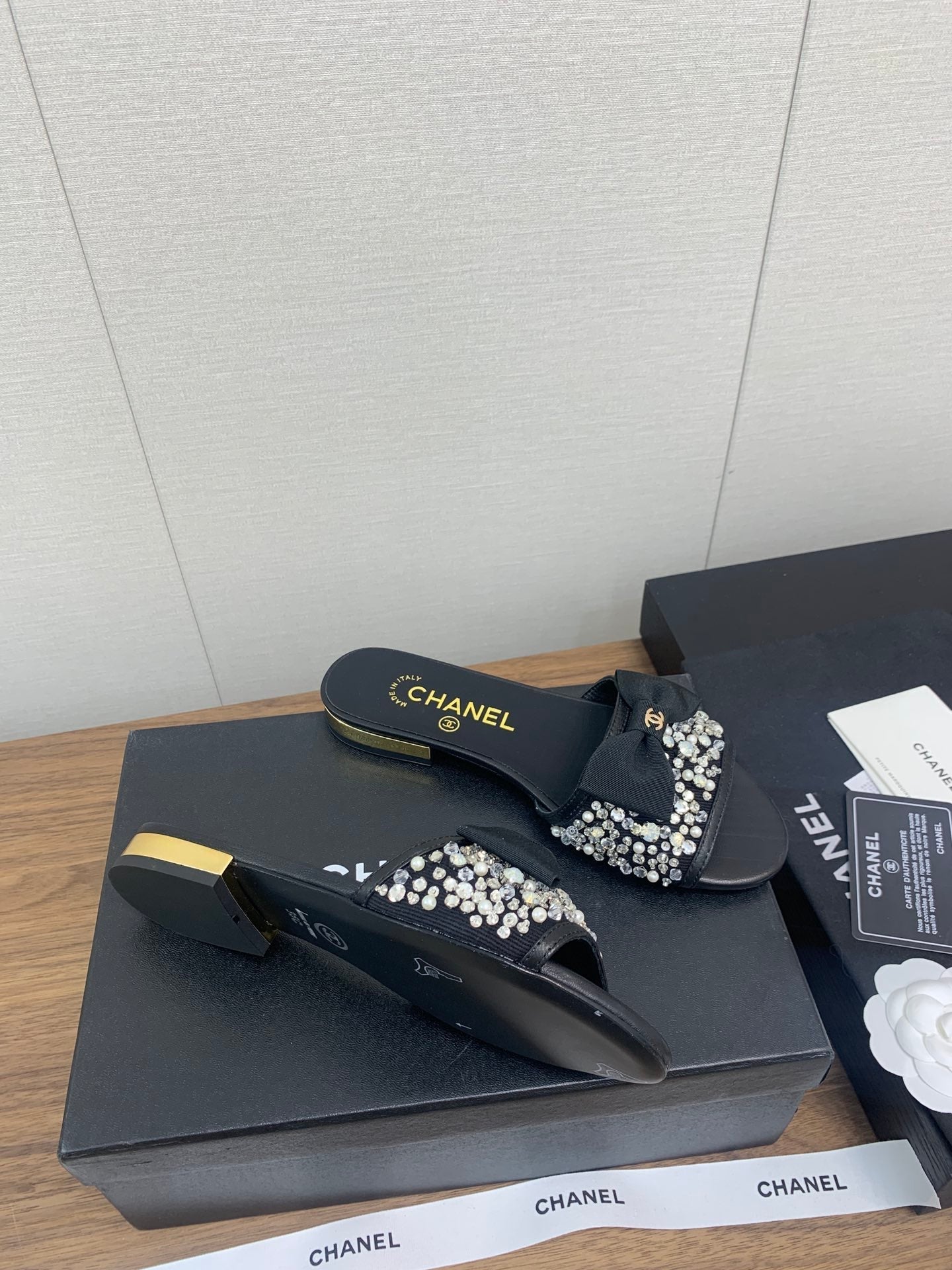 CHANEL BOW SLIPPERS IN BLACK LAMBSKIN WITH RHINESTONES