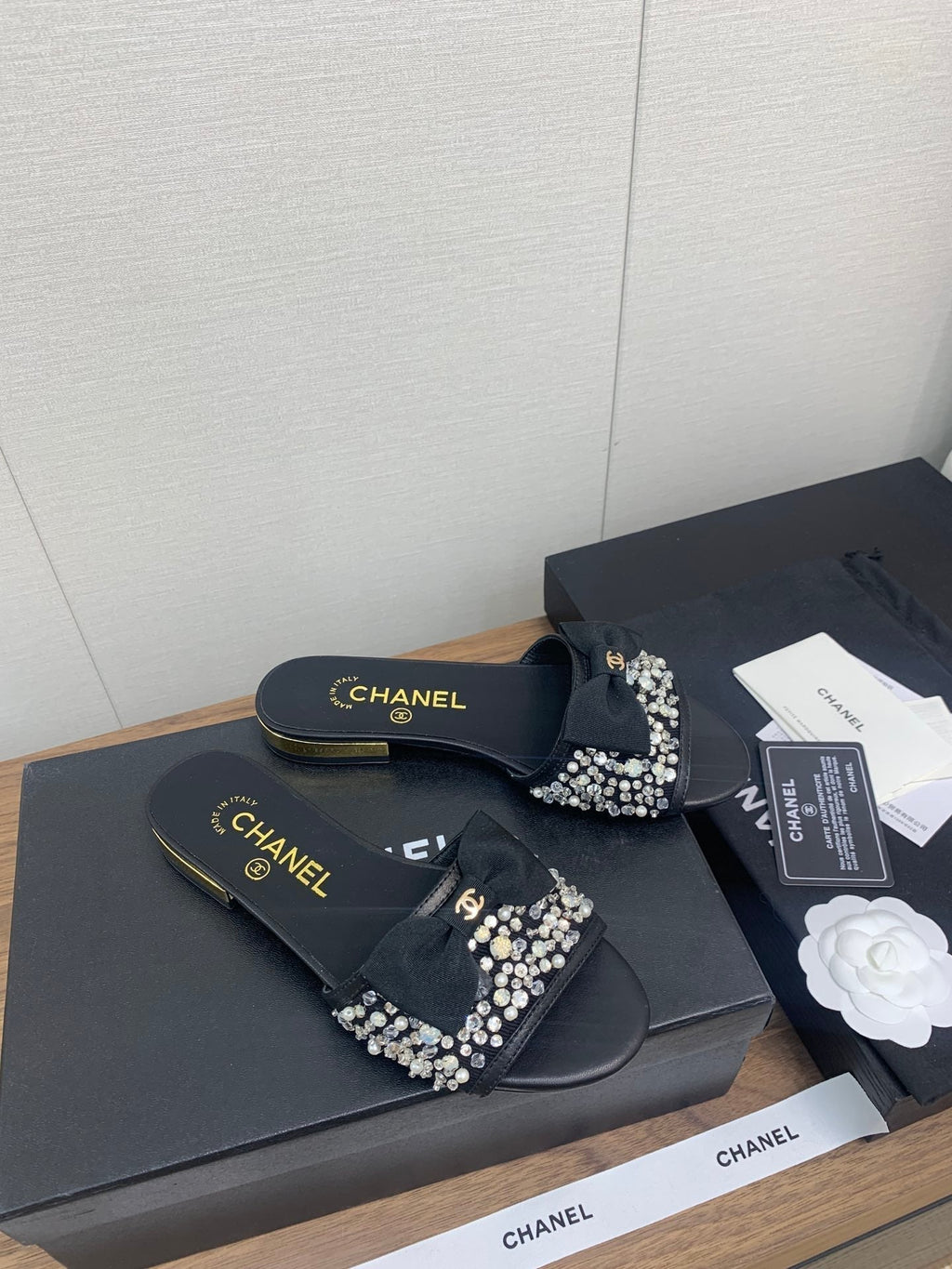 CHANEL BOW SLIPPERS IN BLACK LAMBSKIN WITH RHINESTONES