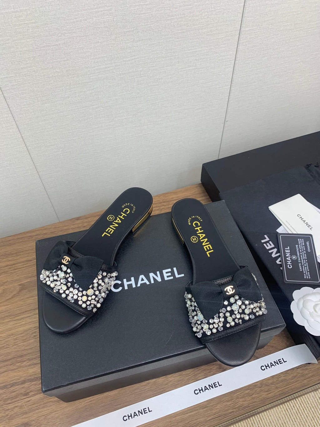CHANEL BOW SLIPPERS IN BLACK LAMBSKIN WITH RHINESTONES
