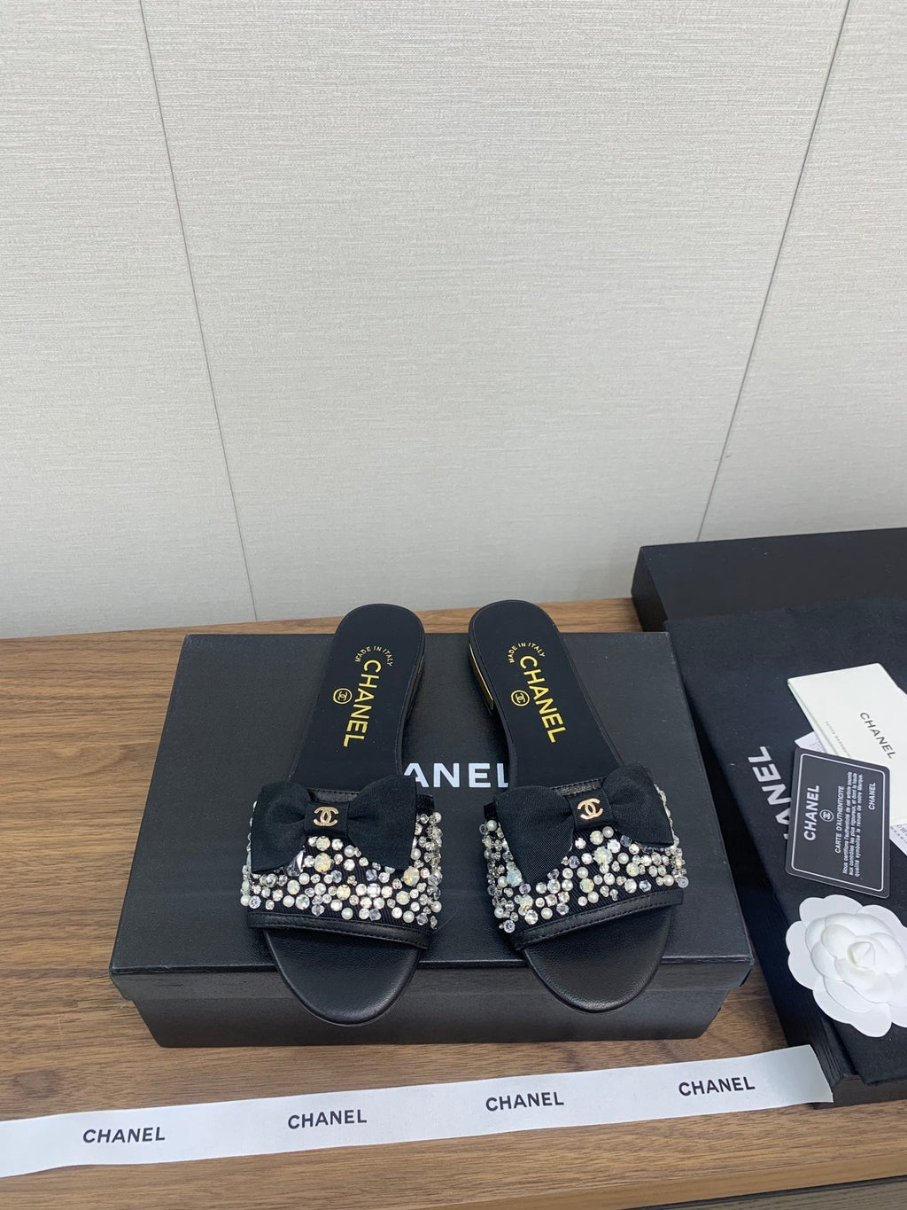 CHANEL BOW SLIPPERS IN BLACK LAMBSKIN WITH RHINESTONES