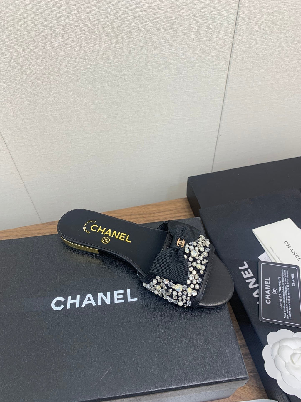 CHANEL BOW SLIPPERS IN BLACK LAMBSKIN WITH RHINESTONES