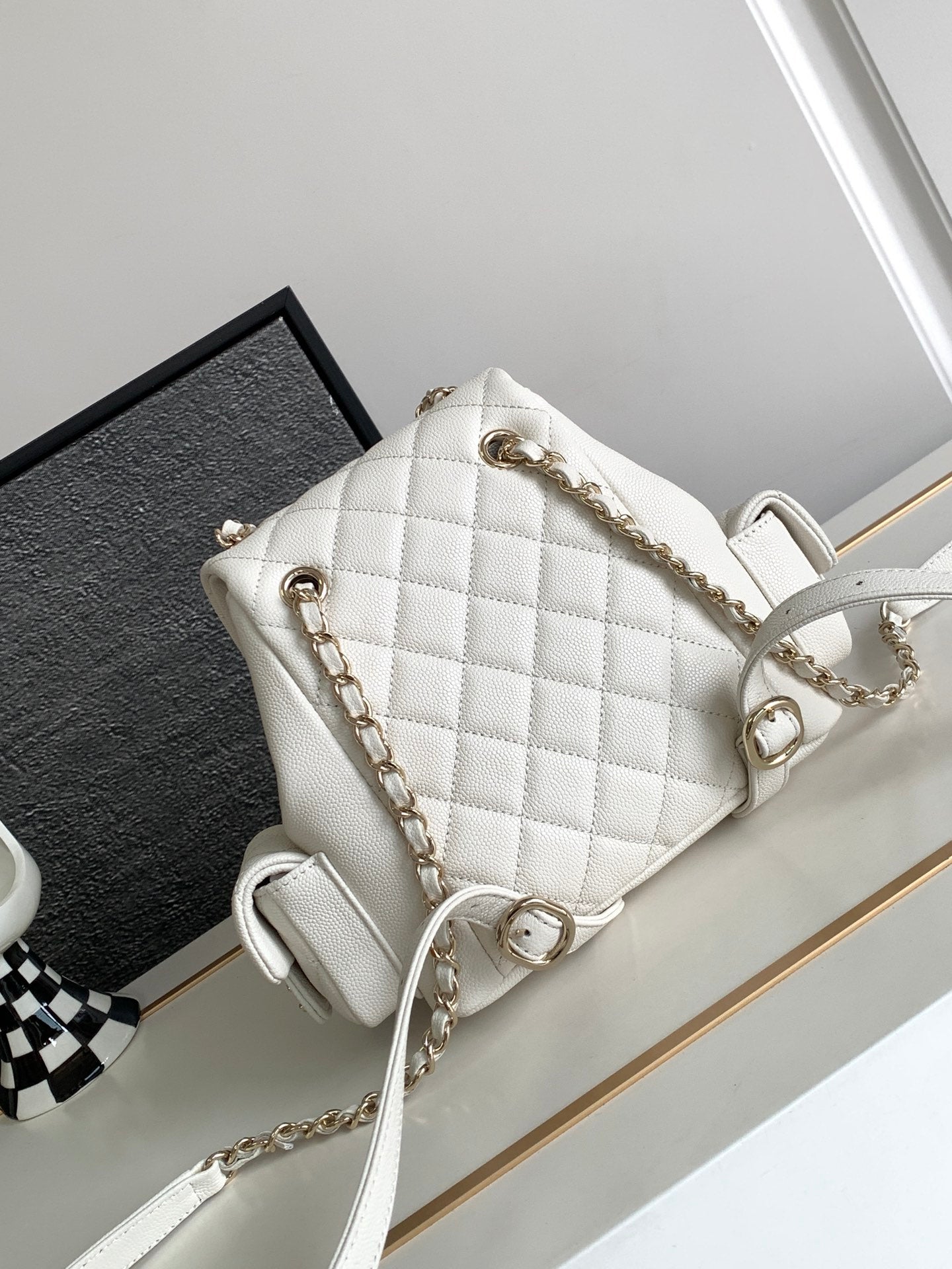 CHANEL DUMA BACKPACK 21 IN WHITE CALFSKIN
