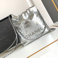CHANEL 22 BAG IN SILVER SHINY CALFSKIN AND GOLD METAL
