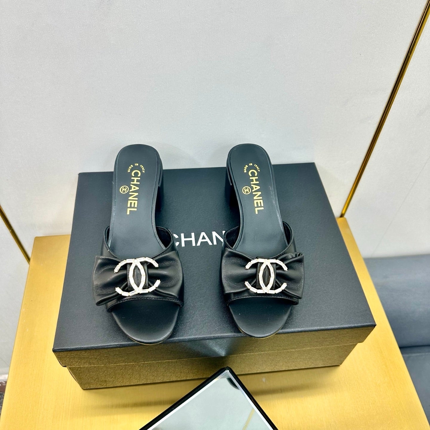 CHANEL BOWKNOT RHINESTONES MID HEEL MULE IN BLACK CALFSKIN