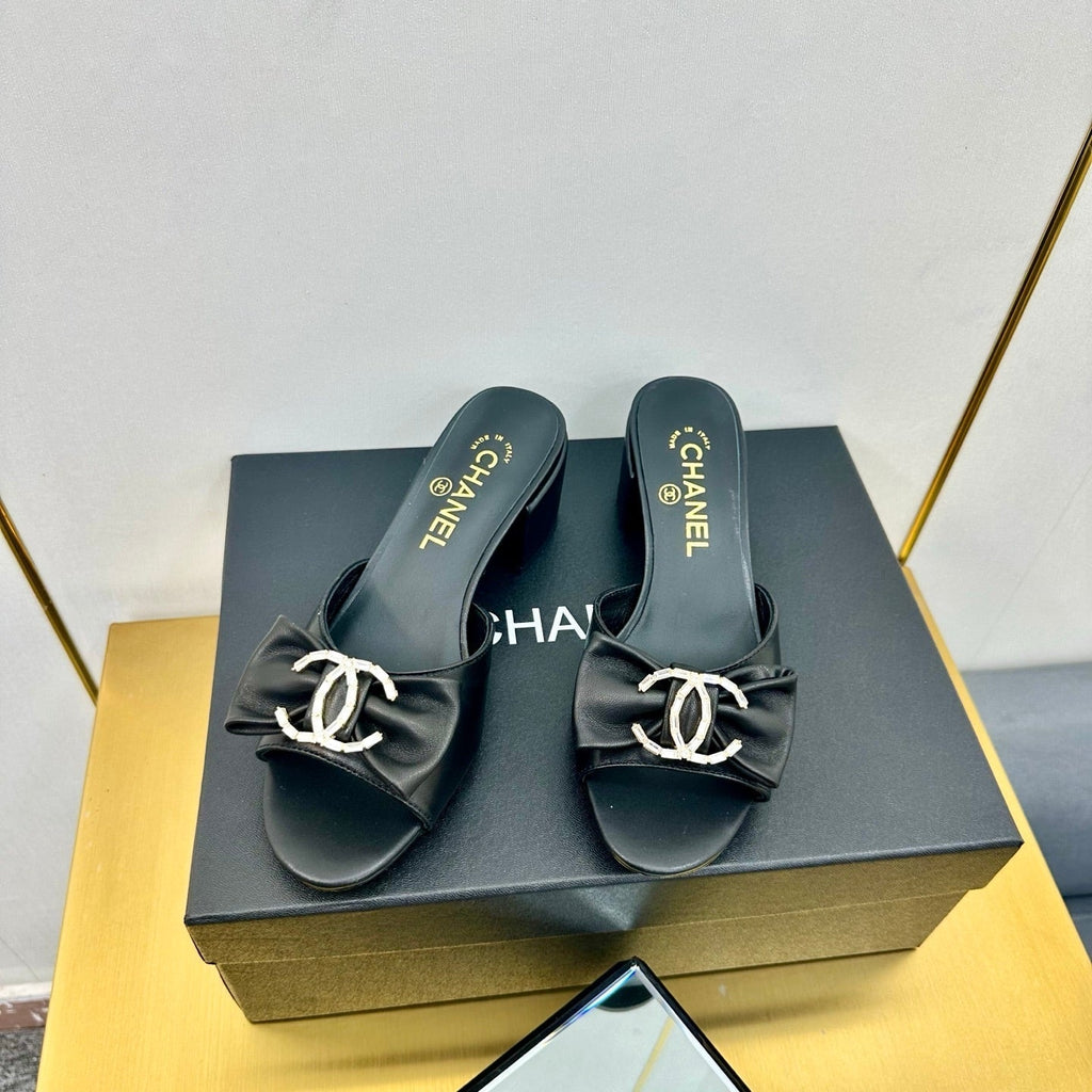 CHANEL BOWKNOT RHINESTONES MID HEEL MULE IN BLACK CALFSKIN