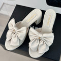CHANEL Double  Big Bow High Heels Sheepskin White