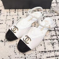 CHANEL FLAT SLINGBACKS IN WHITE MIX BLACK CALFSKIN
