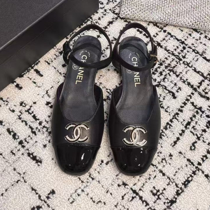 CHANEL FLAT SLINGBACKS IN BLACK CALFSKIN