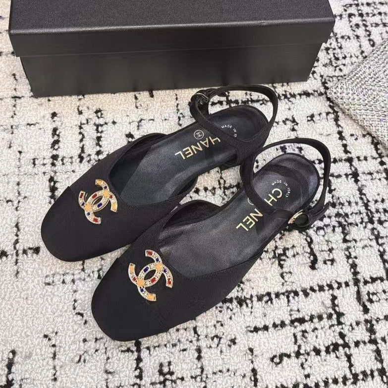 CHANEL FLAT SLINGBACKS IN BLACK FABRIC