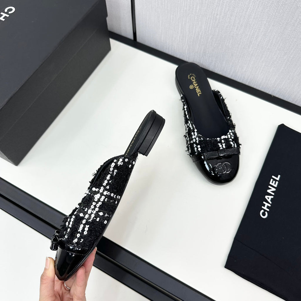 CHANEL BOW MULE IN BLACK MIX WHITE FUR AND CALFSKIN