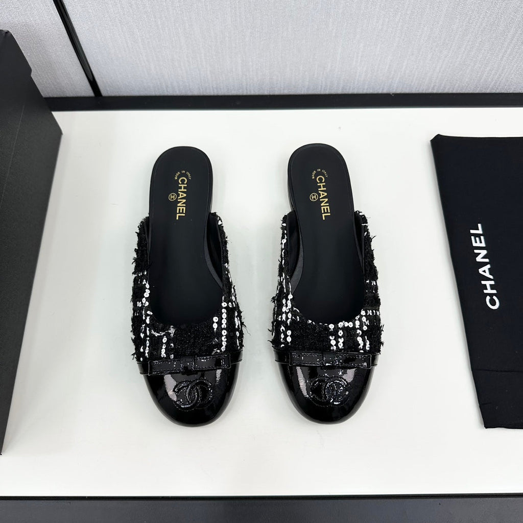 CHANEL BOW MULE IN BLACK MIX WHITE FUR AND CALFSKIN