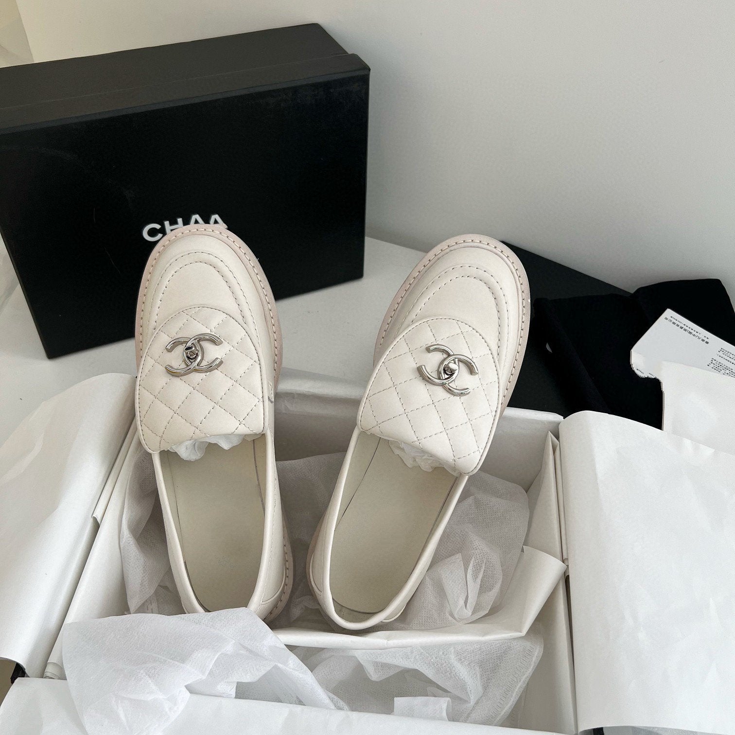 CHANEL Moasins White Quilted Calfskin Silver